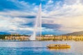City of Geneva with famous Jet d'Eau fountain at sunset, Switzerland Royalty Free Stock Photo