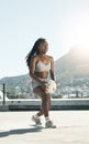 City, girl and soccer on rooftop for sports fitness training with concentration in South Africa. Exercise, football and Royalty Free Stock Photo