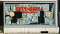 City Grill Restaurant out of business, window covered with newpapers. Royalty Free Stock Photo