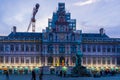 The city hall of antwerp with monumental statue lighted at night, grotemarkt, Antwerpen, Belgium, April 23, 2019