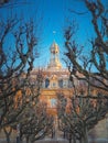 City Hall of Asnieres as seen through the sycamore trees alley outdoors in the park. AsniÃÂ¨res-sur-Seine mairie backyard facade Royalty Free Stock Photo