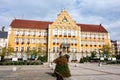 The city hall building in the center of Cesky Tesin city at CSA town square with bush in front of it