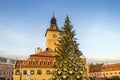 City Hall building and Christmas Tree in the old city center of Brasov on a winter day Royalty Free Stock Photo