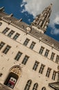 City Hall building and its gothic tower intentionally crooked at the Grand Place of Brussels.