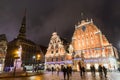 City Hall Square with House of the Blackheads and Saint Peter church in Old Town of Riga at night during Christmas, Latvia Royalty Free Stock Photo