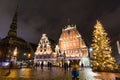 City Hall Square with House of the Blackheads and Saint Peter church in Old Town of Riga at night during Christmas, Latvia Royalty Free Stock Photo