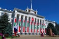 City hall of the Tiraspol, Transnistria, Moldova - the city administration building is decorated with state flags and banners to