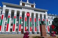 City hall of the Tiraspol, Transnistria, Moldova - the city administration building is decorated with state flags and banners to