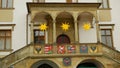 City Hall tower and historic buildings in Olomouc, national coats arms blazon crest shields of statehood of Moravia and