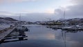 Harstad harbour at sunset in winter in Northern Norway Royalty Free Stock Photo