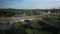 City highway. Overpass across the river. On the horizon at home. Aerial photography