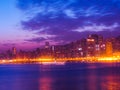 City of Hong Kong with water front with sunrise sky background