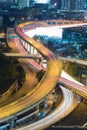 City interchange overpass highwayCity downtown intersection overpass at night during busy hour Royalty Free Stock Photo