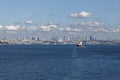 The City of Istanbul with a general Cargo Vessel approaching the Bosphorus Straits Royalty Free Stock Photo