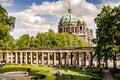 Historic Roman Landmark Surrounded by Lush Green Park and Dome Cathedral in Berlin. (06-07-2023 - Berlin, Germany
