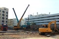 City and landscape,construction machinery,excavator and crane in working site area Royalty Free Stock Photo