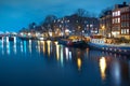 City landscape. Houseboat in the tourist area of Amsterdam at night Royalty Free Stock Photo