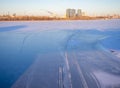 City landscape. Ice on the river. Top view of a snowmobile track. Ski track Royalty Free Stock Photo