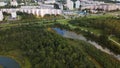 City landscape. Nearby there is a park area. Aerial photography Royalty Free Stock Photo