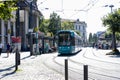 city landscape, people waiting tram for desired transport route, german public transport system, transport infrastructure,