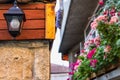 City landscape - stylized lamp on street with flowers