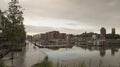 City landscape. Sunset on the embankment after rain