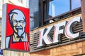 City landscape - view of the sign of a fast food restaurant of the KFC chain on Wenceslas Square of Prague Royalty Free Stock Photo