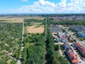 City landscape with wheat fields, forest and countryside, aerial view