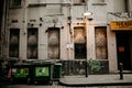 City laneway with rubbish bins and old building, Melbourne, Australia