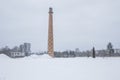 Urban city photo at Latvia, old tower. Winter, snow and building Royalty Free Stock Photo