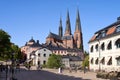 City life in the center of Uppsala, Sweden with a view of Cathedral on backrgound Royalty Free Stock Photo