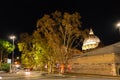 City life in central Rome and view of the Basilica di San Pietro dome at night Royalty Free Stock Photo