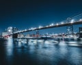 City light and a bridge over the river during nighttime