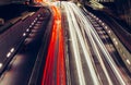 City light trails of fast moving traffic on road in London at ni Royalty Free Stock Photo