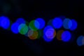 City lights big abstract circular bokeh on black background. Royalty Free Stock Photo