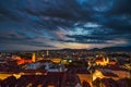 City lights of Graz and Mariahilfer church, view from the Schlossberg hill, in Graz, Styria region, Austria, after sunset. Royalty Free Stock Photo