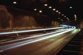 city lights long exposure street life in the city speed highway white and red lights environment cars in a tunnel Royalty Free Stock Photo