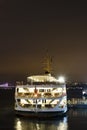 .city lines ferry at eminonu pier at dusk Royalty Free Stock Photo