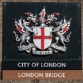 City of London coat of arms plaque on the London Bridge, London, England