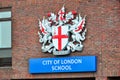 City of London school emblem on wall in London, UK Royalty Free Stock Photo