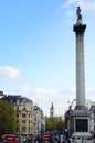 City of London, View from Trafalgar Square: Big Ben, double deckers, red phone box, taxi cab, people Royalty Free Stock Photo