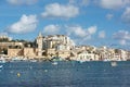 City Marsascala, Malta, sep 2, 2018: panoramic view of Marsascala Marsaskala,with a path lining the water of Mediterranean sea.