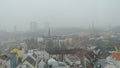 City in the mist, skyline of fog city, critical environment of Air Pollution upon balcony downtown district in Hamburg Germany