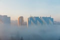 City at misty sunrise Royalty Free Stock Photo