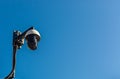 City monitoring. Camera against the blue sky. Public safety. Royalty Free Stock Photo