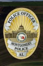 City of Montgomery Police shield on the side of a car