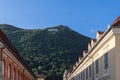 City name Brasov written with huge white letters on top of forested Mount Tampa is a recognizable city sign, Romania Royalty Free Stock Photo