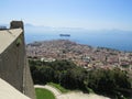 The city of Naples from above. Napoli. Italy. Vesuvius volcano behind.Orthodox church cross and the moon. Royalty Free Stock Photo