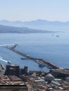 The city of Naples from above. Napoli. Italy. Vesuvius volcano behind.Orthodox church cross and the moon. Royalty Free Stock Photo