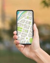 City Navigation. Smartphone With Mobile Map On Screen In Female Hand Royalty Free Stock Photo